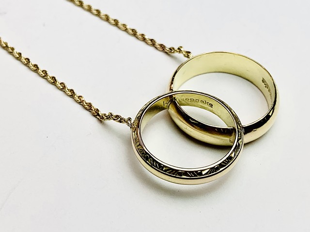 Necklace: 18k gold. Friend of the family lost her husband and turned his wedding ring into a beautiful necklace piece.