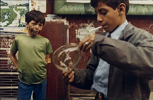 Helen Levitt

New York, 1972. 
[Two boys; one with face paint, one blowing a bubble]