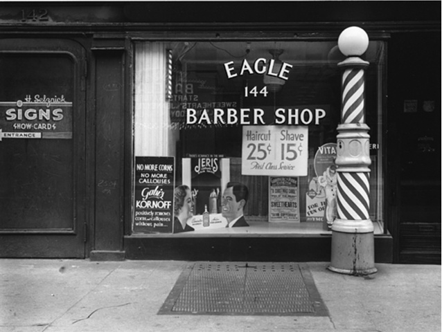 Rudy Burckhardt

New York, 1940. [Barber shop window]