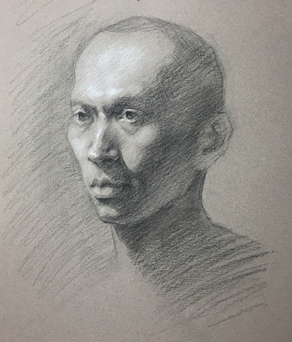 charcoal portrait drawing on paper