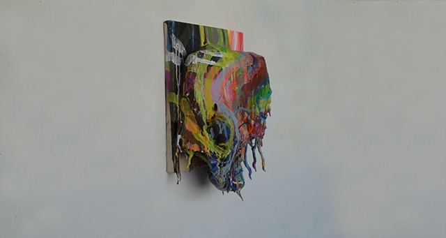 Five-inch thick slab of acrylic and spray paint with drips and multi-colored stripes which cause the dimentionality of the slab to flatten out.
