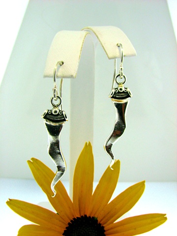 Sterling Silver elongated french hook style casted earrings.