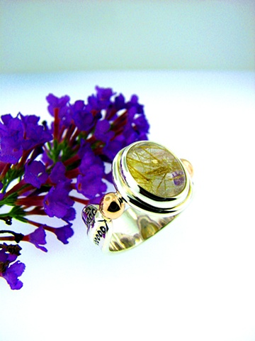 2-Tone sterling silver + 14k yellow gold setting with 10x12mm oval Rutilated Quartz cab. and beaded highlights.