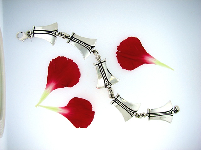 Sterling Silver link bracelet with large lobster claw clasp.