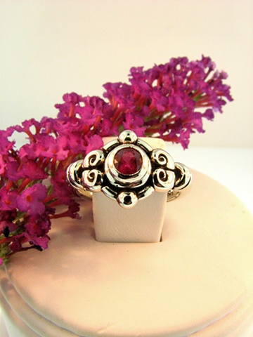 14k white gold ring with 5mm round select ruby.