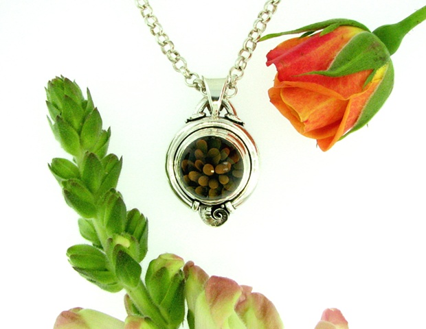 Small Sterling Silver Glass bead pendant with attached 18in. Rolo chain.  (glass by KXB glass.)
