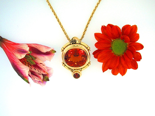 14ky pendant with Lg. 20+ ct. Madeira Citrine and a 6 mm Spessartite Garnet accent.