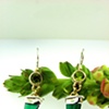 2-Tone Sterling Silver + 14k Yellow Gold earrings with custom 16mm length bullet cabs + select 6mm round Peridot accents.