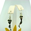 Sterling Silver elongated french hook style casted earrings.