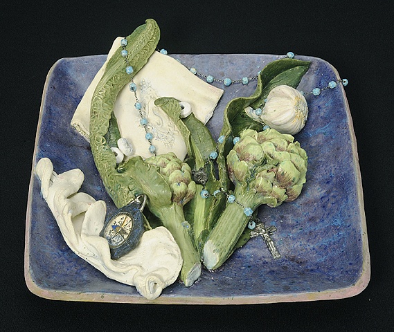 trompe l'oeil ceramic plate with ceramic artichoke, garlic, white glove, rosary beads, embroidered handkerchief by Linda S Fitz Gibbon