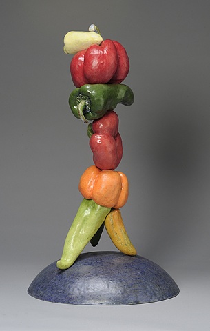 ceramic figure composed of peppers by Linda S Fitz Gibbon