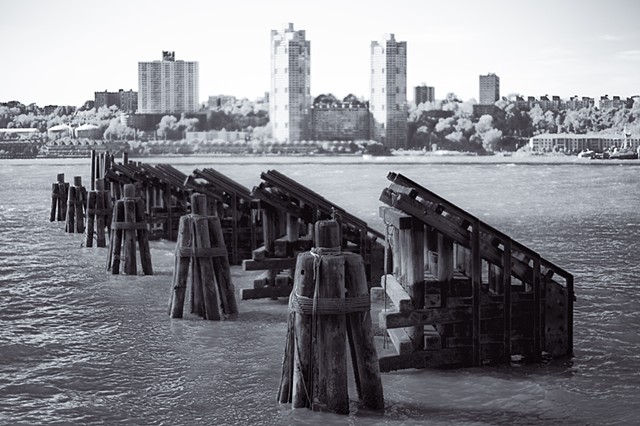 Photograph of Pilings and New Jersey across the Hudson River, by Judith Ebenstein