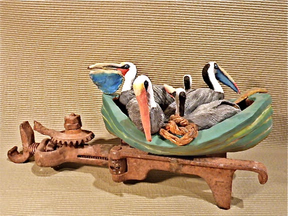 pelicans in an old boat