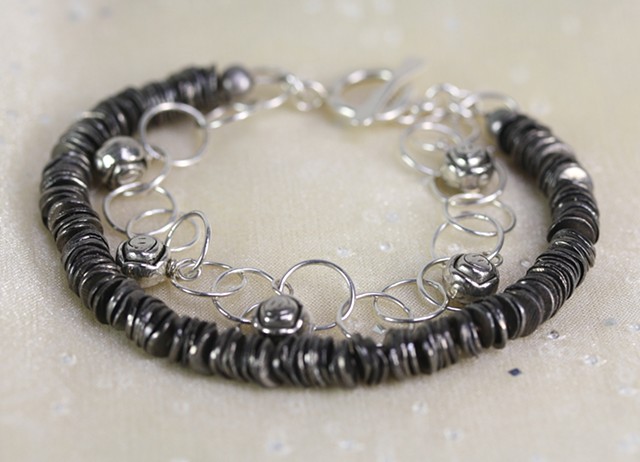Two-strand German silver, sterling, and fine silver bracelet