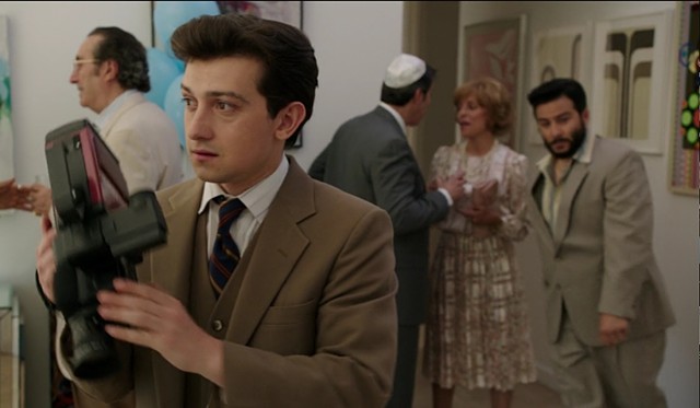 Two works (right hand wall) on the set of Red Oaks series