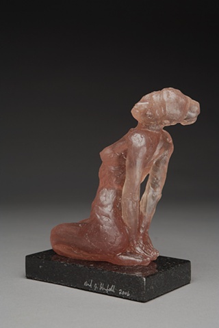 cast glass female figure rhubarb granite base 