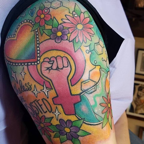 Lisa Frank style feminist tattoo