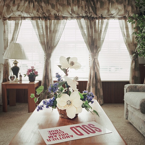 sold sign with plastic flowers, manufactured display home,  Amy Eckert www.amyeckertphoto.com