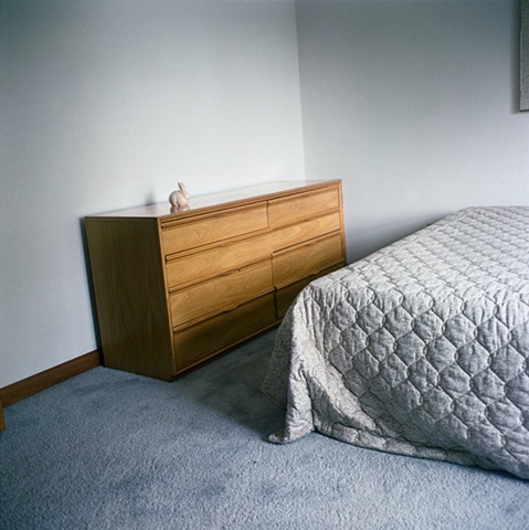 A ceramic bunny decorates a bedroom in a manufactured display home, © Amy Eckert www.amyeckertphoto.com