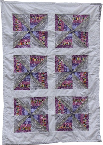 "Pinwheels in Motion" baby quilt for C