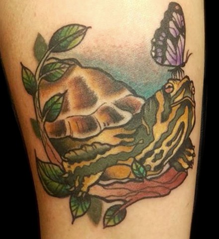 Neo traditional style tattoo of turtle and butterfly on lower arm by Gina Marie of Copper Fox in kissimmee Florida