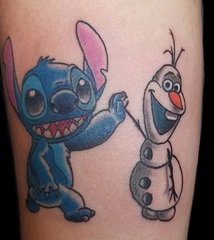 Stitch and Olaf high five Frozen and Disney tattoo by Gina Marie of Copper Fox Tattoo