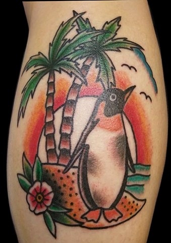 Traditional tattoo of penguin on island by Gina Marie of copper Fox tattoo