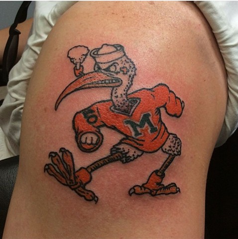 Miami Hurricanes College Football Basketball Baseball mascot traditional tattoo full color on arm by Gina Marie of Copper Fox Tattoo Company