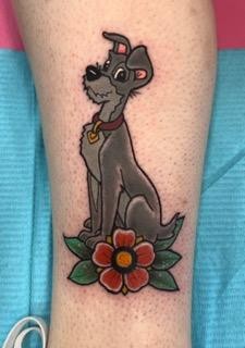 The Tramp from Disneys Lady and the Tramp by Tahiti Gil of Copper Fox Tattoo in Kissimmee Florida best tattoo shop near me Disney tattoos