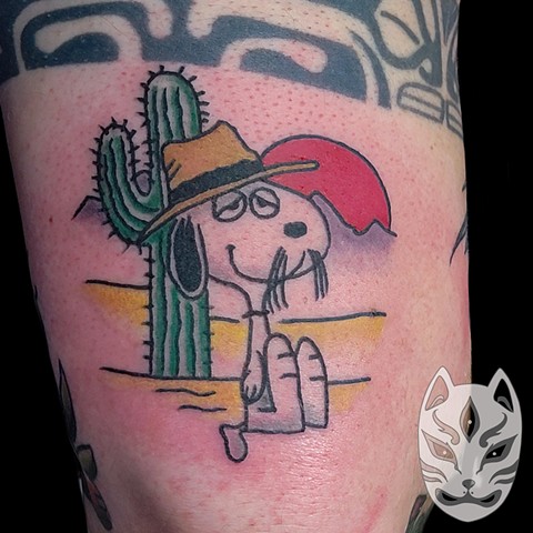 Traditional tattoo of Spike from Peanuts by Gina Matuo of Copper Fox Tattoo in Kissimmee Florida