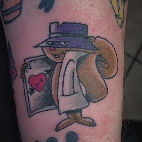 Secret Squirrel color tattoo on lower arm by Gina Matuo of Copper Fox Tattoo in Kissimmee Florida popular tattoos 