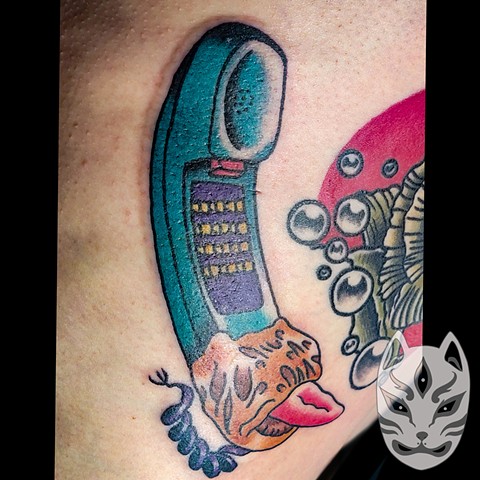 American traditional horror tattoo from the movie Nightmare on Elm Street Freddy Phone by Gina Matuo of Copper Fox Tattoo in Kissimmee Florida