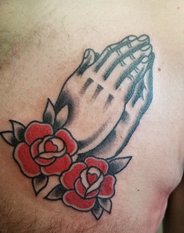 Praying Hands with roses in traditional tattoo style by Gina Marie of Copper Fox Tattoo Company