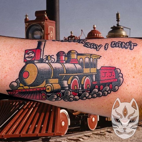 Train locomotive tattoo in traditional style by Gina Matuo of Copper Fox Tattoo in Kissimmee Florida 
