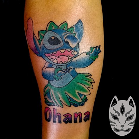 Disney LILO and tattoo of stitch and Obama on forearm by Gina Matuo of Copper Fox Tattoo in Kissimmee Florida