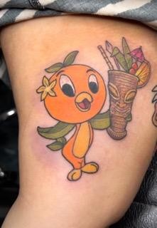 Orange Bird Disney character by Tahiti Gil of Copper Fox Tattoo in Kissimmee Florida Best tattoo shop near me disney tattoos