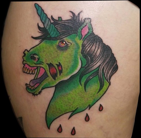 zombie unicorn on upper thigh by Gina Marie of Copper Fox Tattoo in Kissimmee Florida