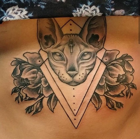 Sternum tattoo, cat sternum tattoo, black and grey tattoo, flowers, flower tattoos, cat tattoos, Kissimmee, Kissimmee tattoo shop, copper Fox tattoo