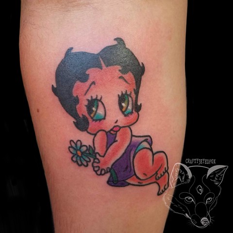 Betty boo- baby tattoo in traditional style on forearm