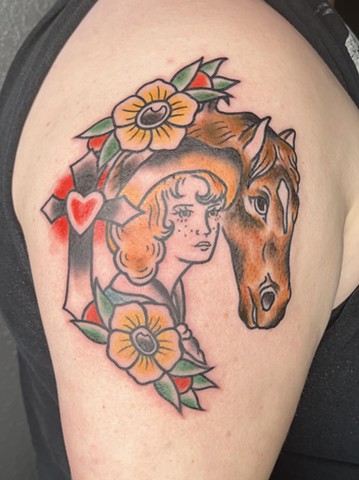 Western cowgirl traditional tattoo on upper arm by Kayla Arruda of Copper Fox Tattoo in Kissimmee Florida shop traditional tattoo shop walk ins