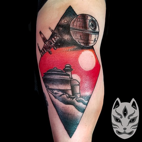 Star Wars tattoo with Death Star and tattooine scenery on back of arm by Gina Marie of Copper Fox in Kissimmee Florida