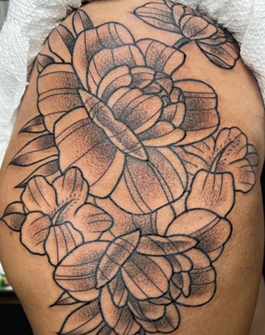 Flower tattoos, tattoos, tattoo shop, tattoo shop near Disney, Kissimmee tattoo shop, traditional tattoos,