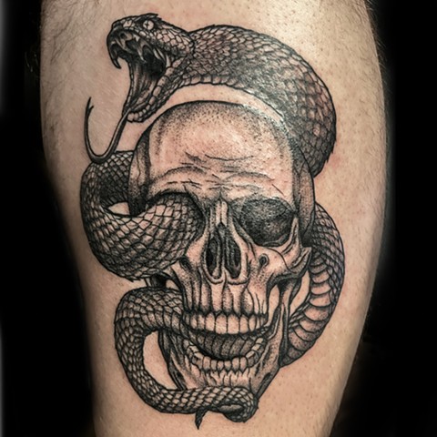 Skull tattoos, skulls, snakes, snake tattoos, skulls and snakes, tattoos, tattooing, tattooshop, Kissimmee tattooshop, tattooshops near disney