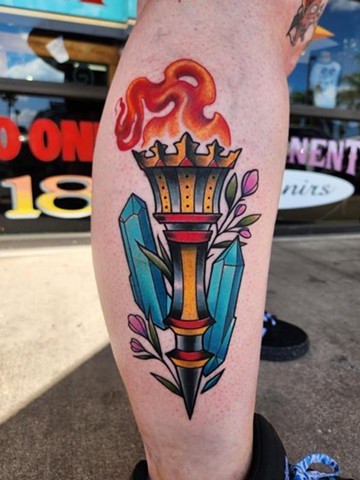 Torch tattoo, traditional tattoos, Kissimmee tattooshop, tattooshops near disney, leg tattoos, tattoos, tattoos with color,