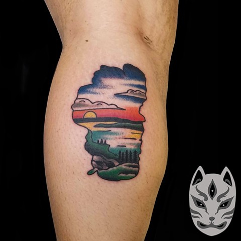 Lake Tahoe tattoo on lower leg in traditional style