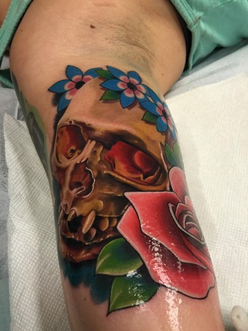Color Realism skull with Traditional flowers mashup tattoo by Klint Who of Copper Fox Tattoo in Kissimmee Florida 