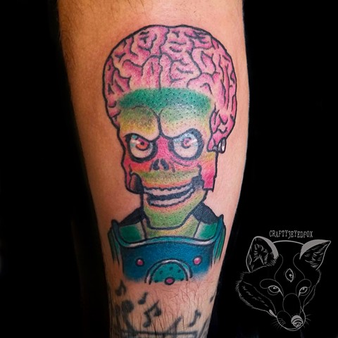 Mars Attacks Alien in traditional style on forearm 