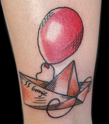 S.S. Georgie from the movie IT pennywise tattoo color on lower leg by Gina Marie of Copper Fox in Kissimmee Florida