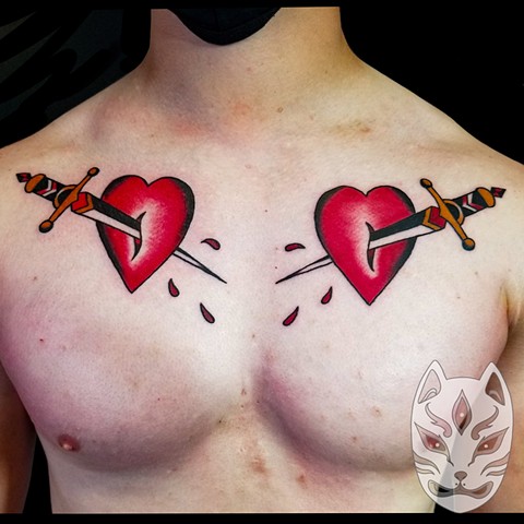 Traditional daggers through hearts on chest by Gina Matuo of Copper Fox in Kissimmee Florida 
