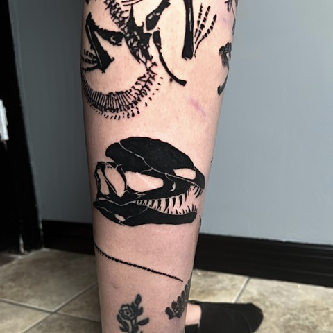 Tattoos, tattooing, tattooshop, dinosaur tattoos, dilophosaurus skull, fun tattoos, tattooshops near disney, Kissimmee tattooshop 